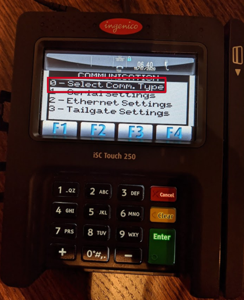 Ingenico iSC Touch 250 EMV device, zero button for select communication type.