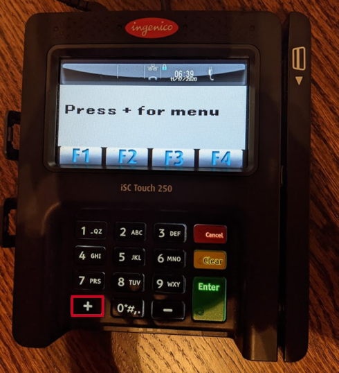 Ingenico iSC Touch 250 EMV device, press plus for men.u